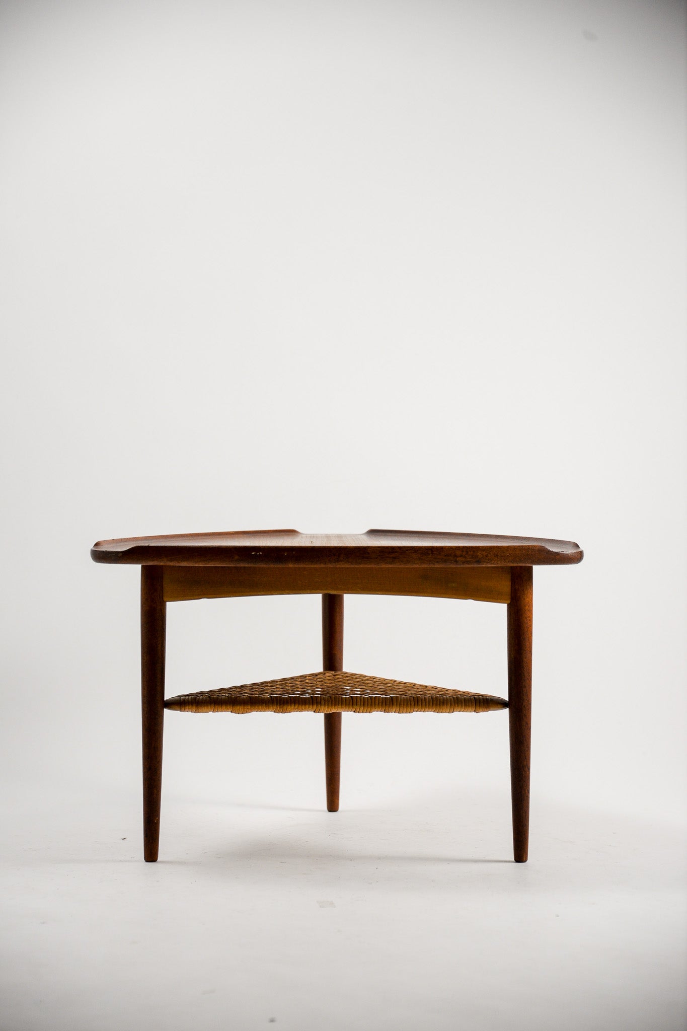 Triangular Coffee Table with Cane Shelf by Johannes Andersen