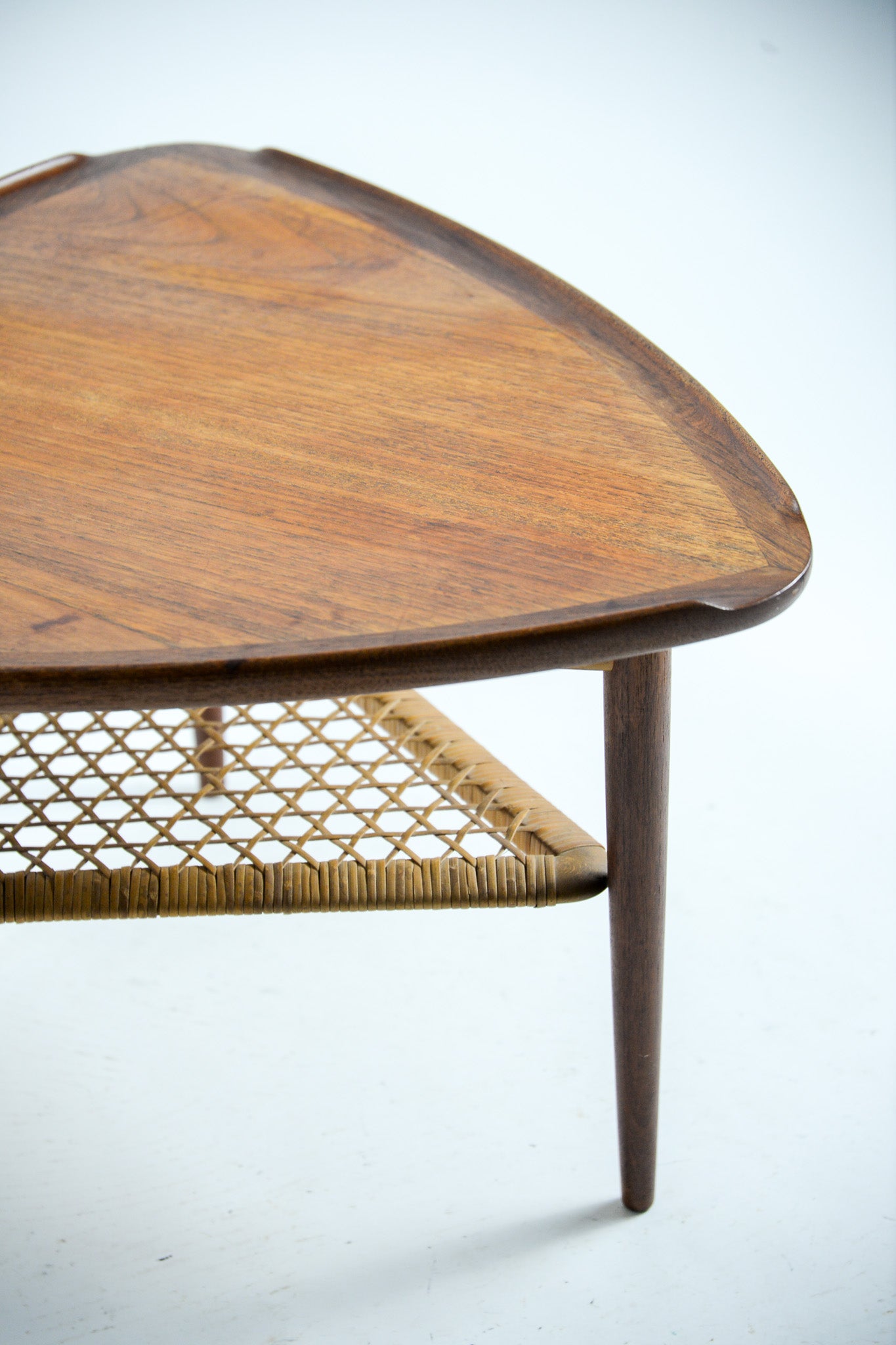 Triangular Coffee Table with Cane Shelf by Johannes Andersen