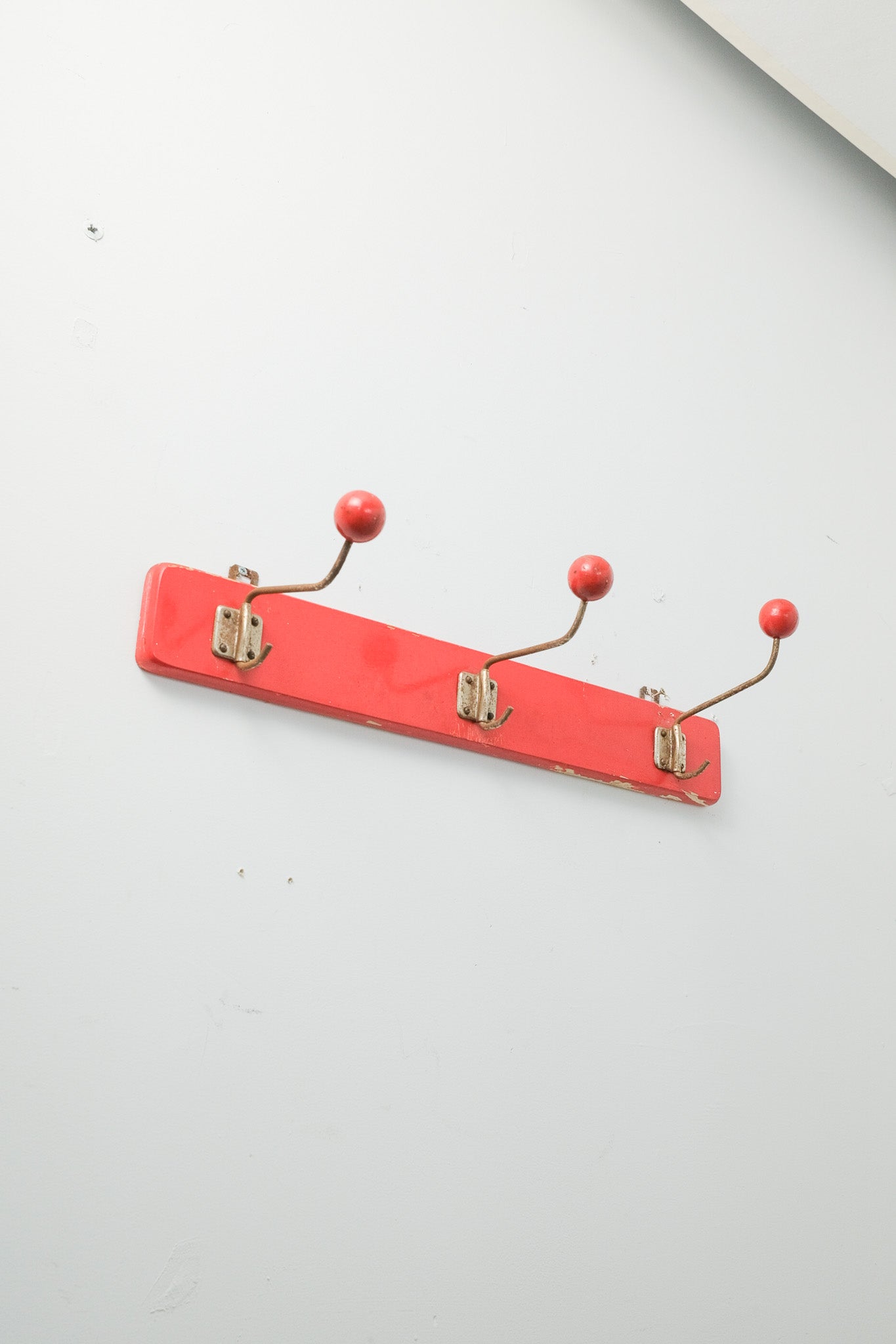 Red Wall-Mounted Coat Rack / 赤い壁付けコートラック