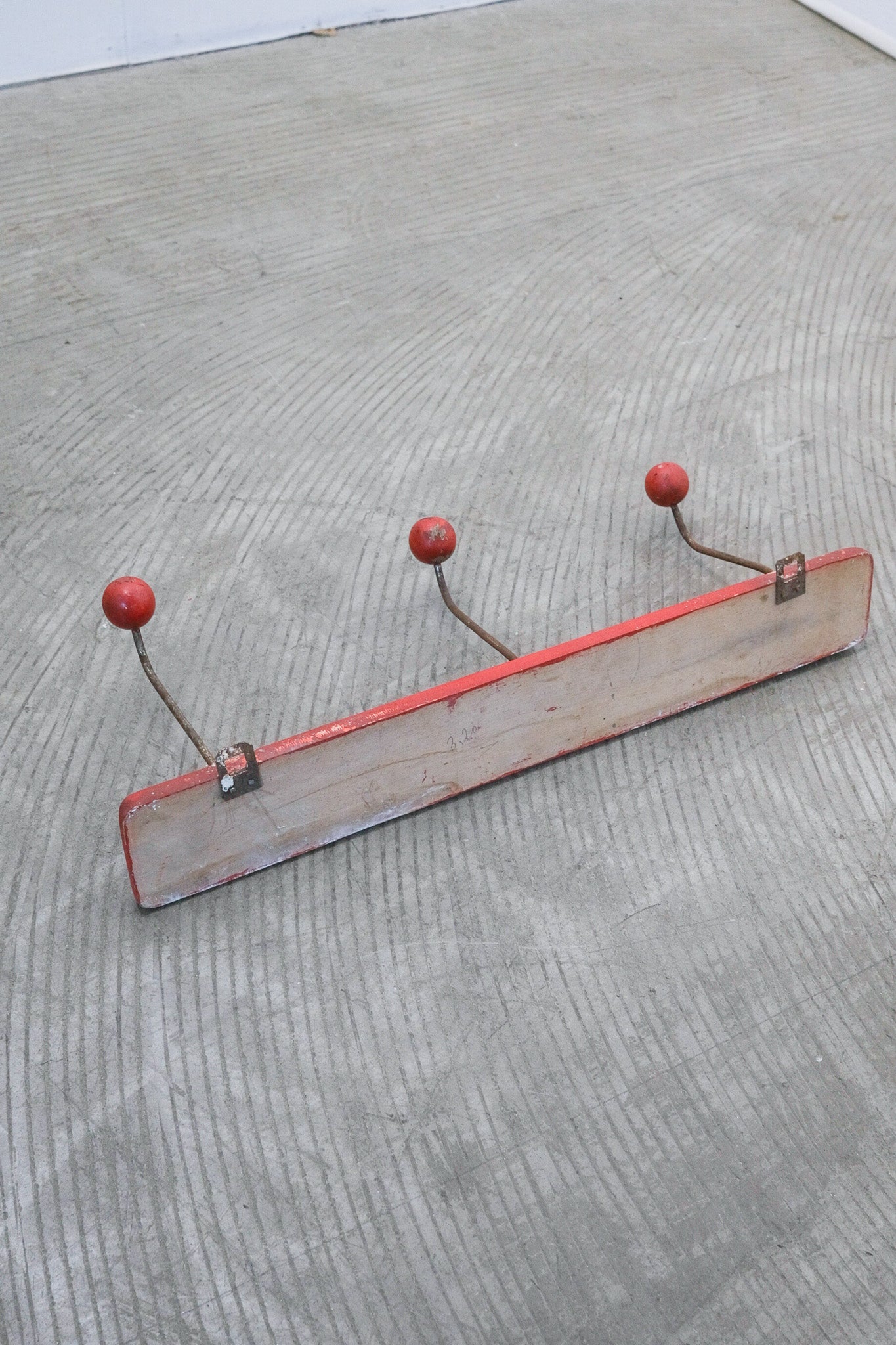 Red Wall-Mounted Coat Rack / 赤い壁付けコートラック