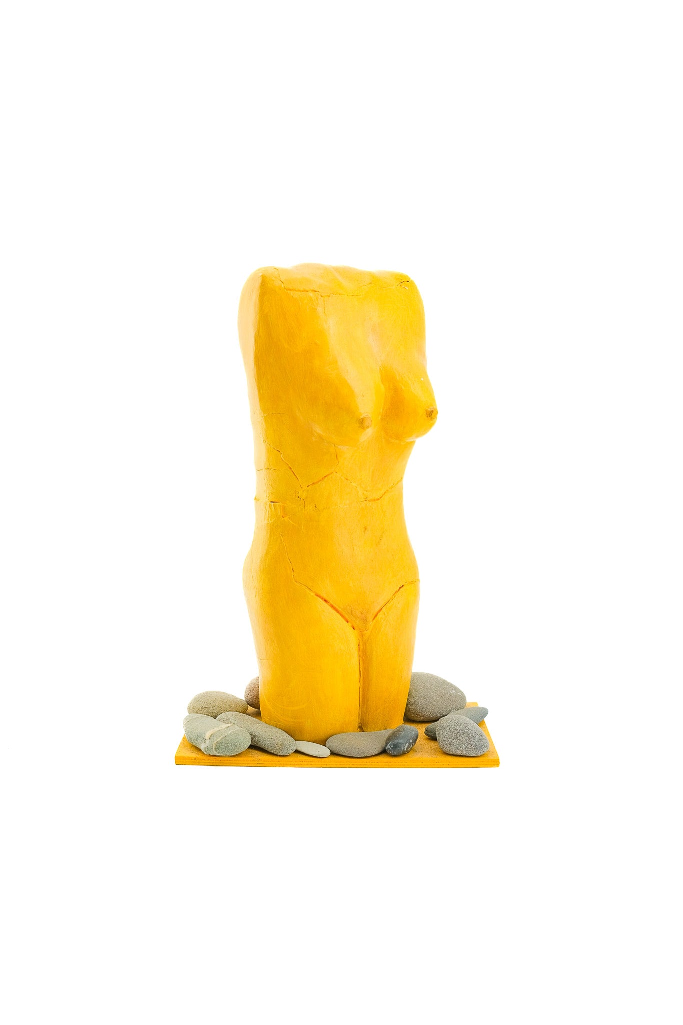 Yellow Female Torso Sculpture with Pebbles / 黄色い裸婦の像